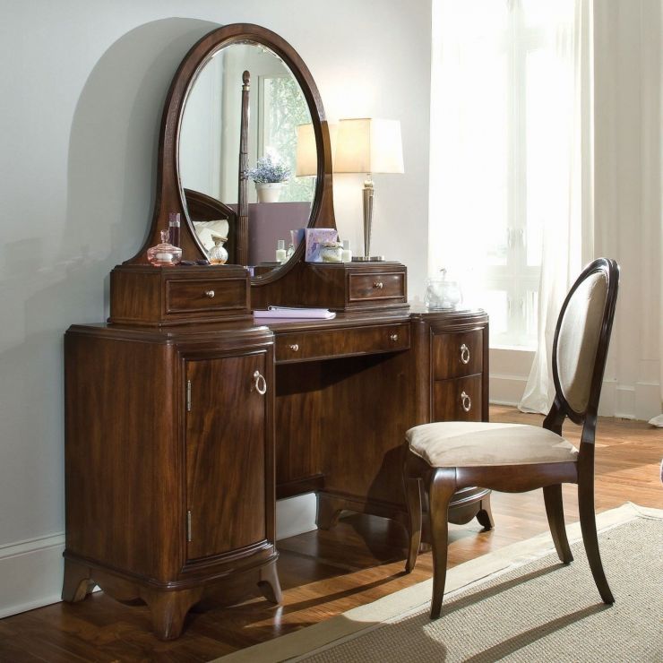 bedroom-furniture-brown-polished-mahogany-wood-dressing-table-with-oval-mirror-and-cabinet-storage-combined-with-amrless-chair-and-white-shade-table-lamp-antique-bedroom-vanity-with-mirror